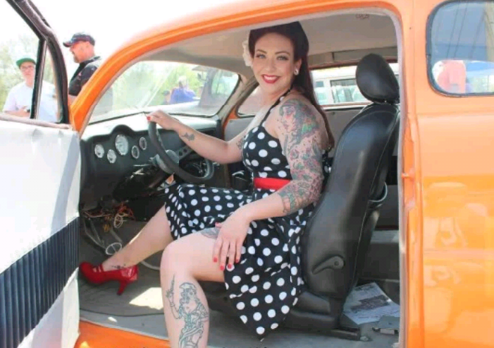 Cars model with beautiful tattoos